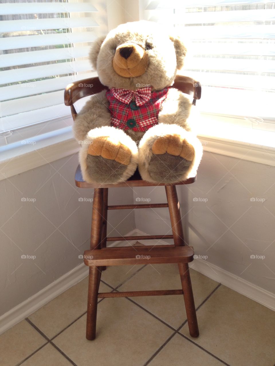 Stuffed bear in a chair