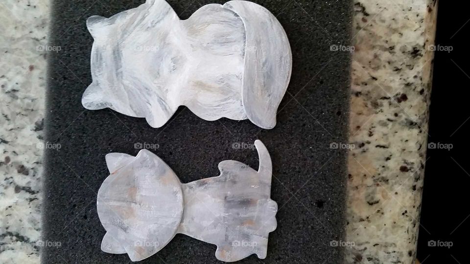 An abstract couple of cats