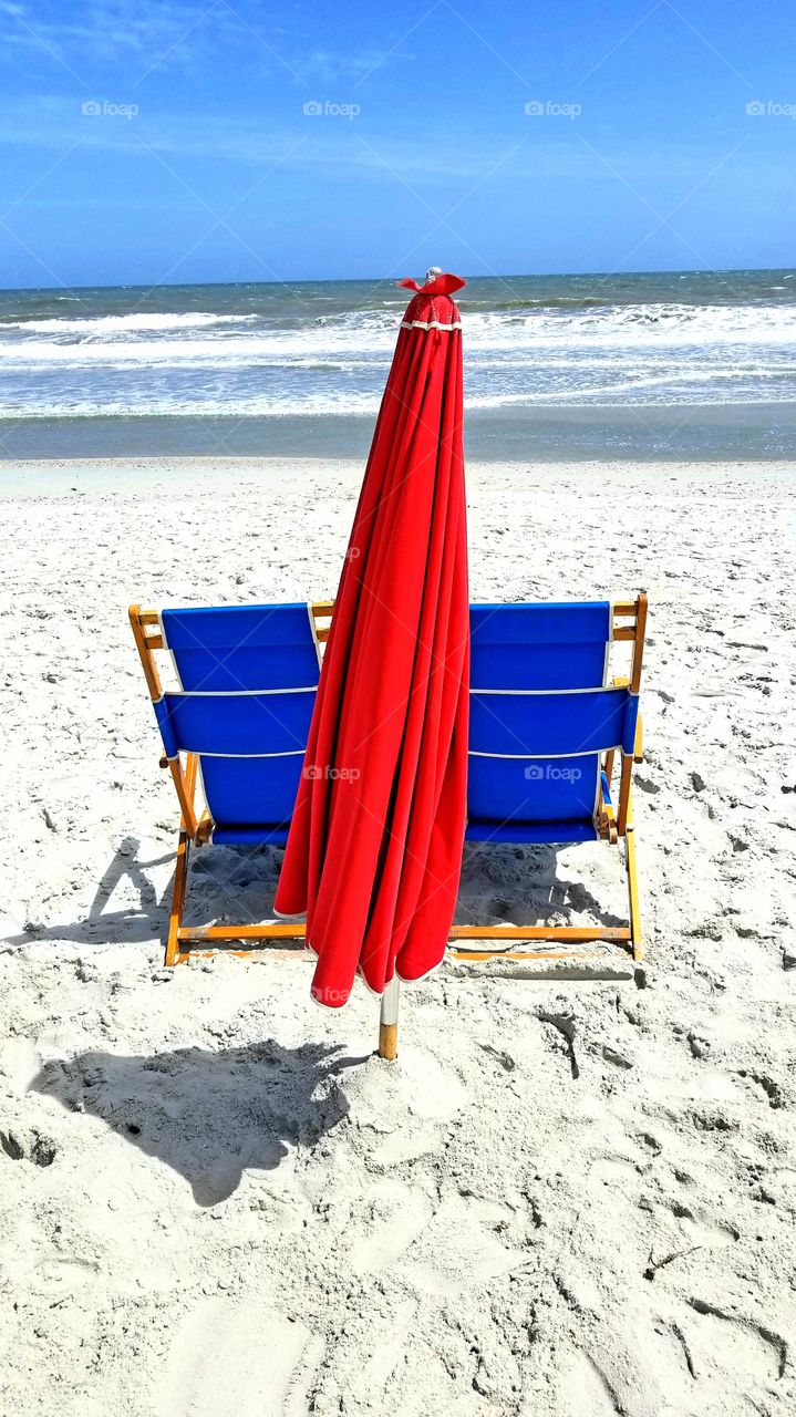Closed beach umbrella