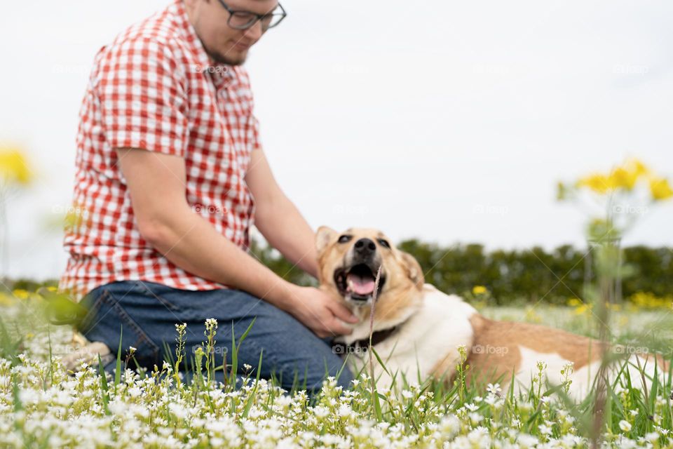 dog and man in spring