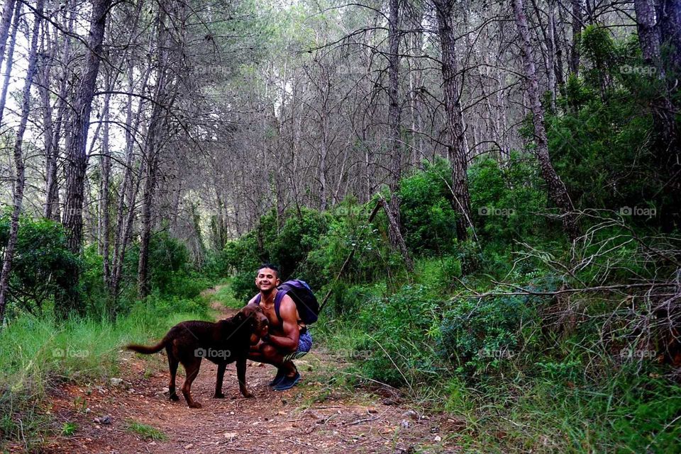 Forest#nature#trees#greengrass#vegetation#human#labrador#adventure