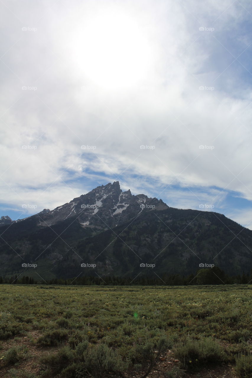 Nature field Prairie Mountain Mountain View hiking outdoors wilderness clouds cloudy scenic beautiful