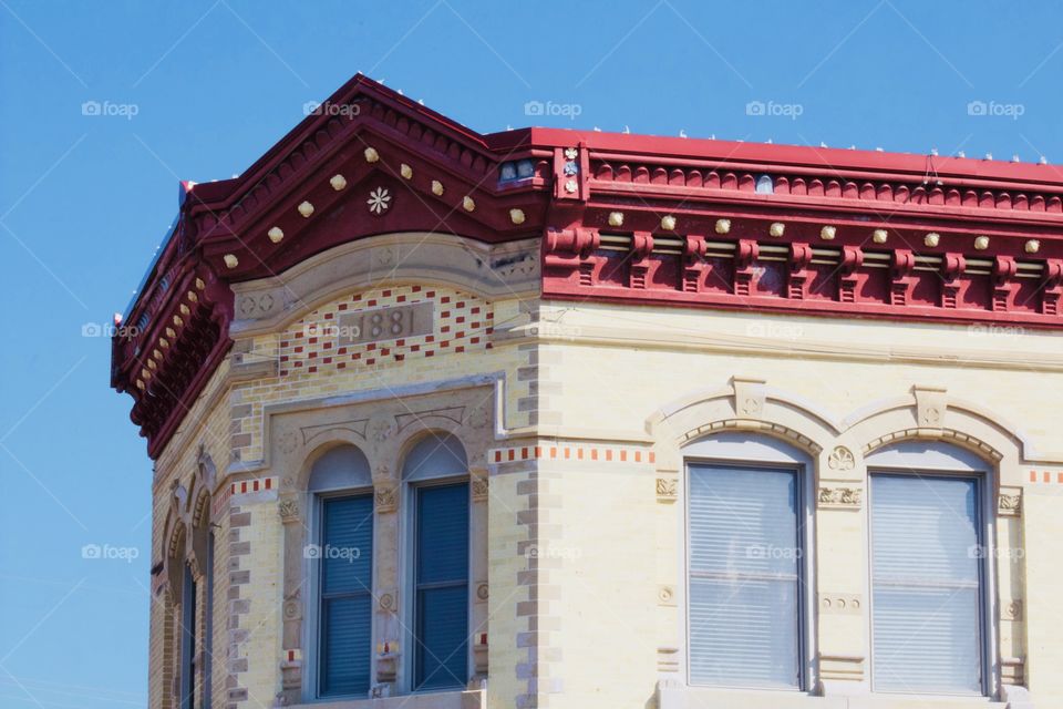 Architectural detail on the front of an historical building, built in 1881