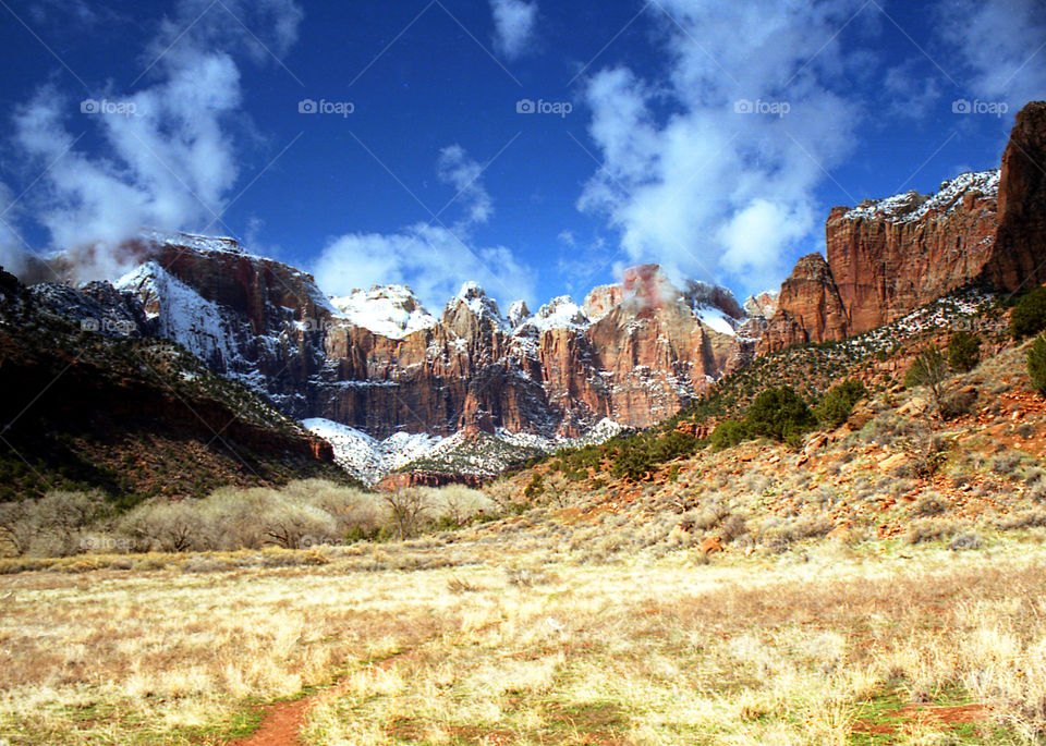 Scenic view of mountain against sky cloud