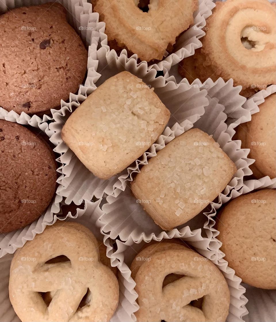 Freshly baked assorted butter cookies close up from above 