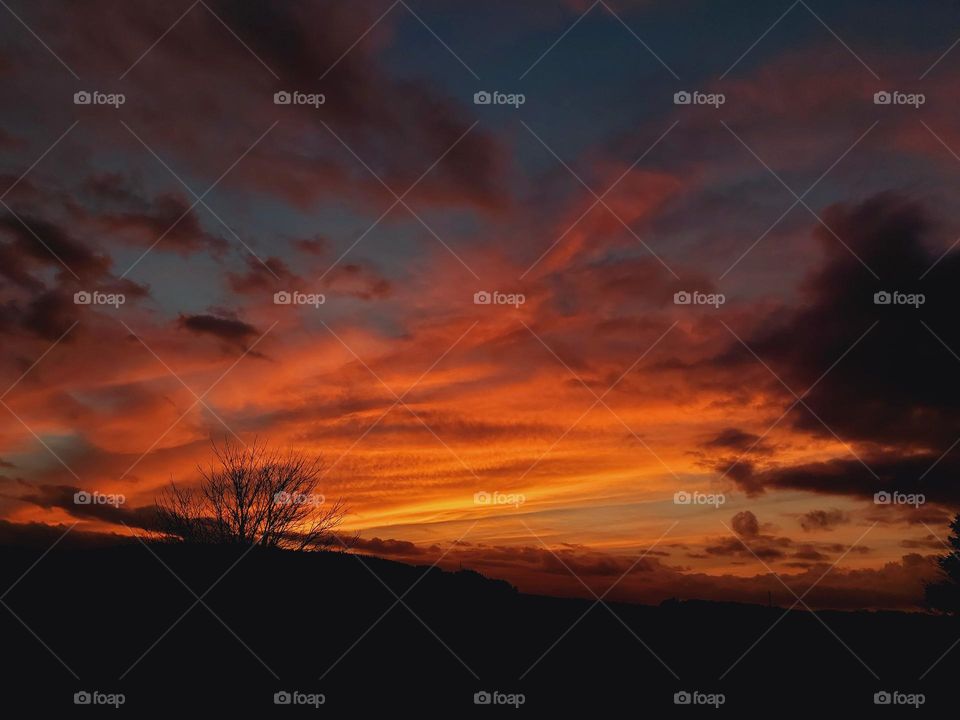 Beautiful and golden sunset over the mountains.