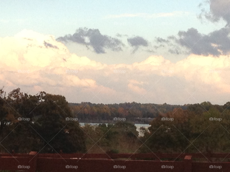 fence colors clouds trees by indescribable