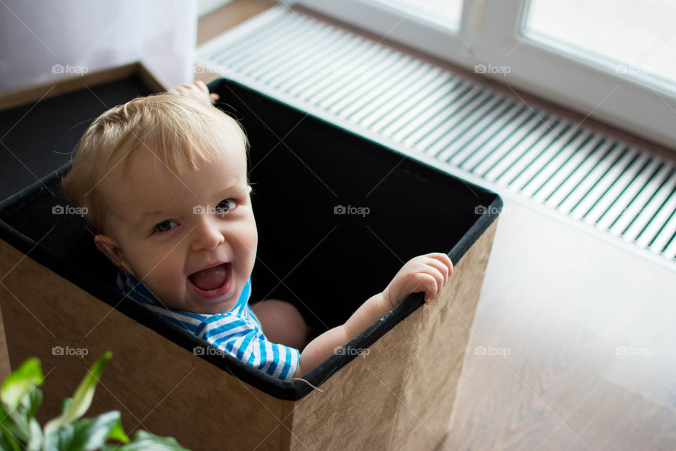 High angle view of smiling baby