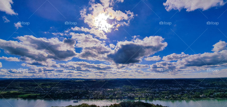 Panoramic view with clouds of the Rheine river valley taken from the Siebengebirge in Königswinter on a sunny autumn day.