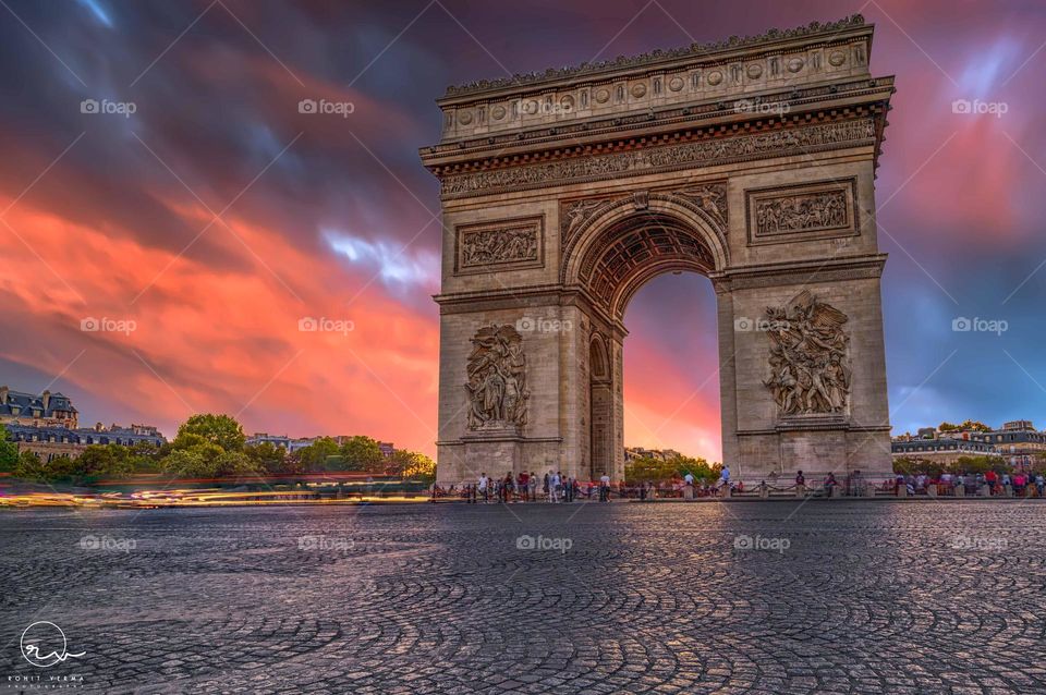 Arc De Triomphe in its full glory in Paris in a captivating sunset 