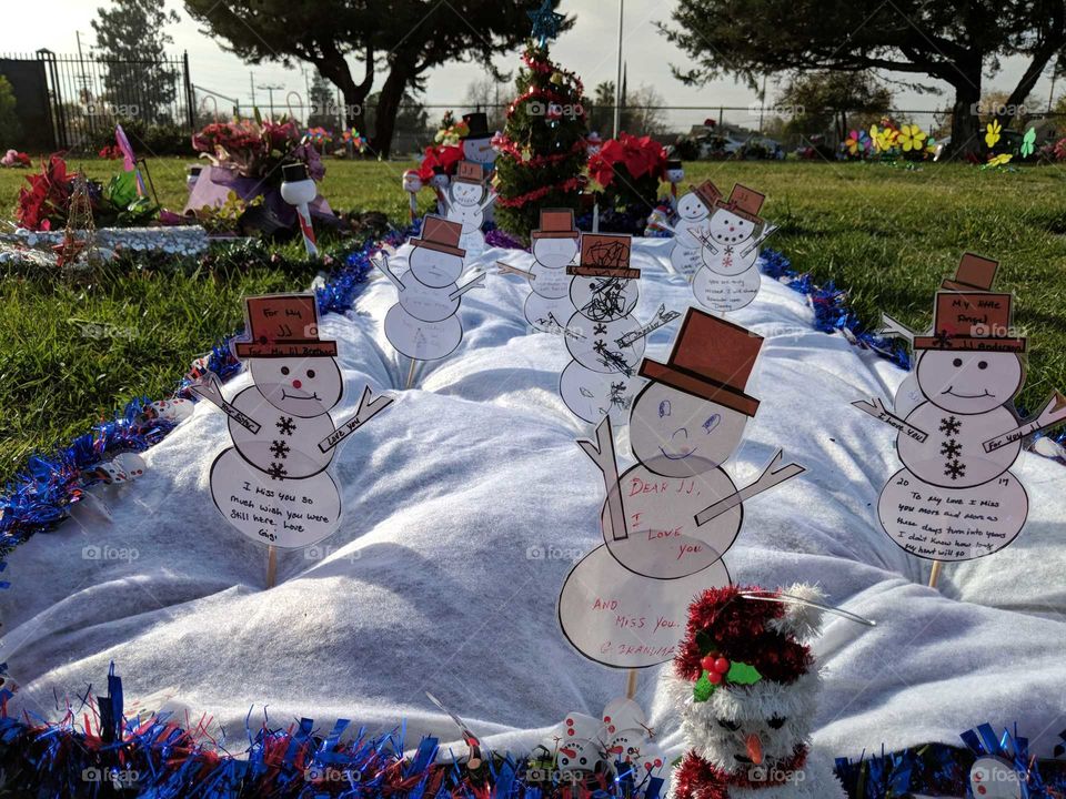 decorated gravesite for Christmas