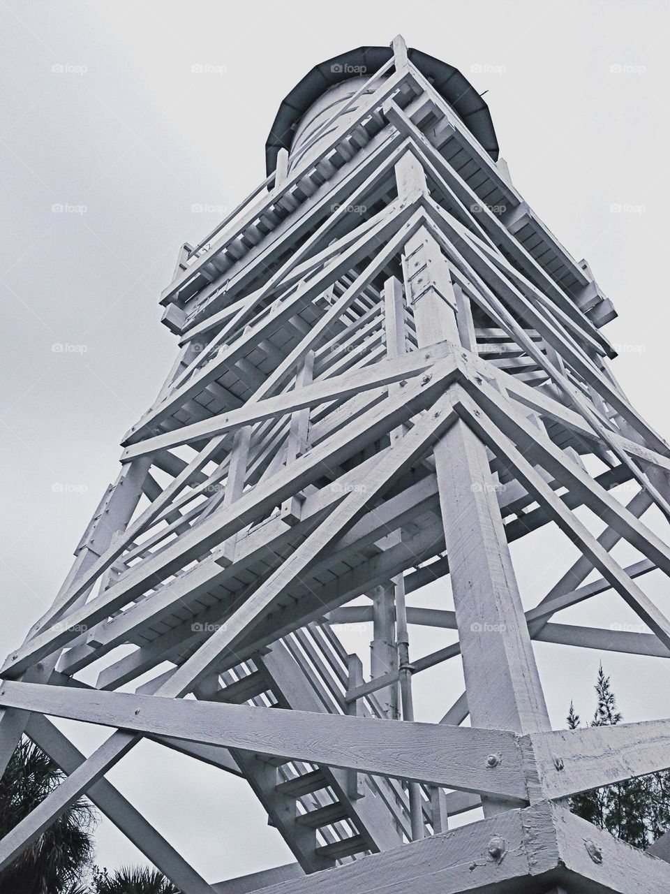 White washed wooden fire tower.