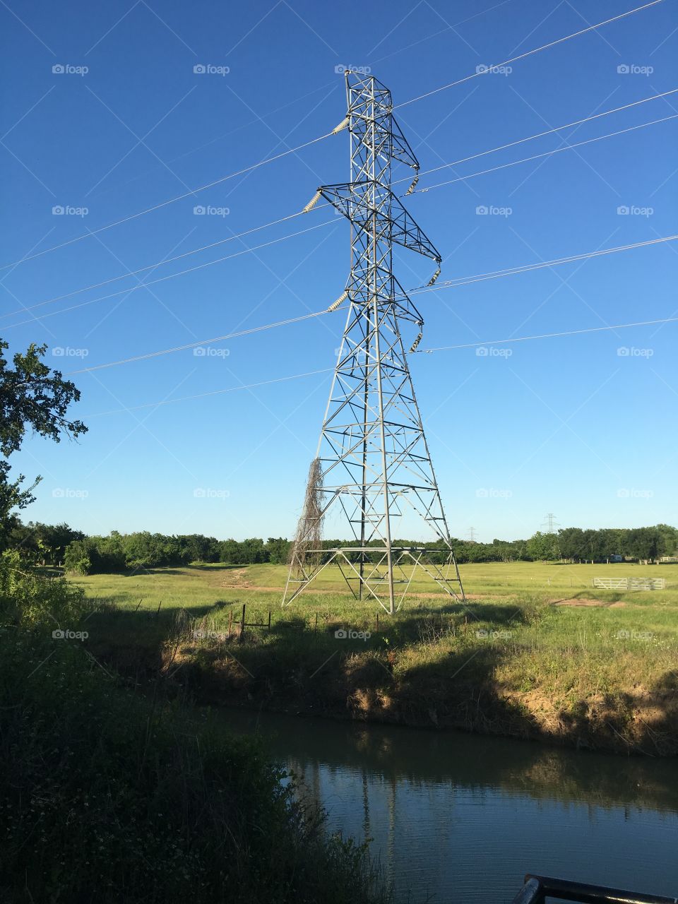 Power lines near a creek.