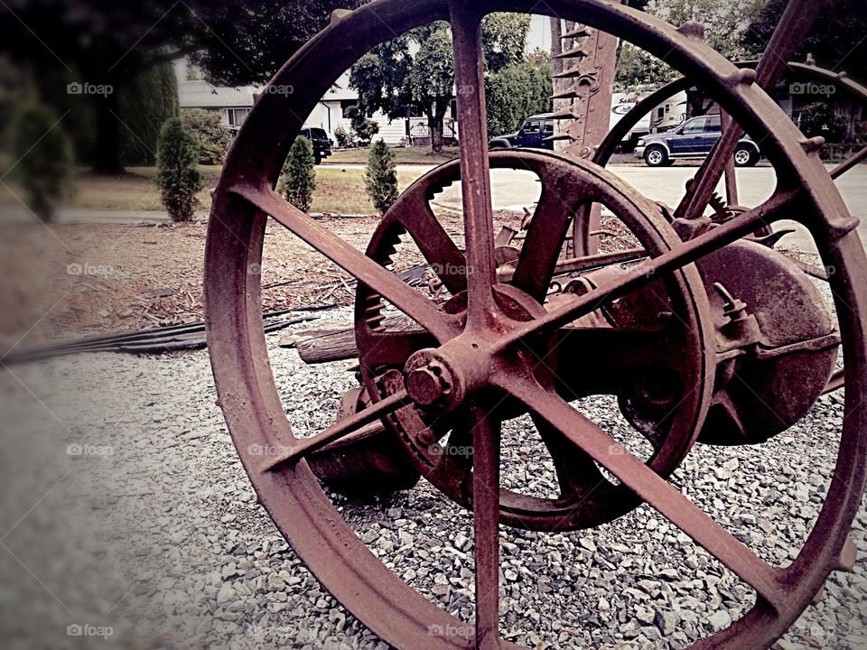 Closeup of rusty plough wheel 