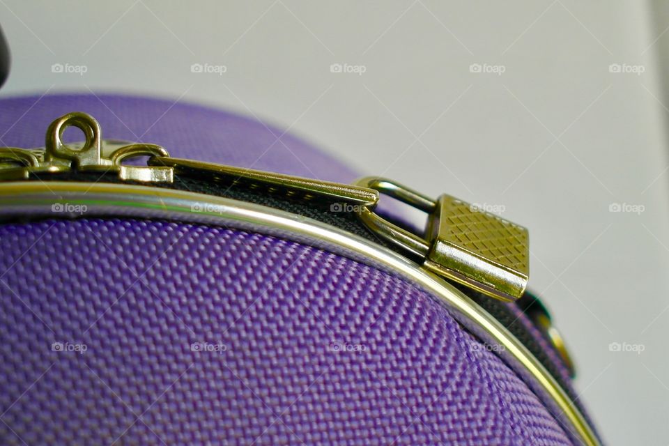 Purple luggage with lock
