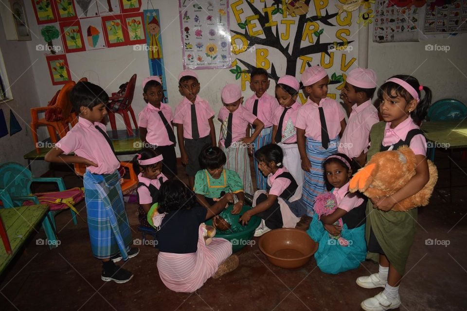 children  playing with dall  at schools for activities workout for children days