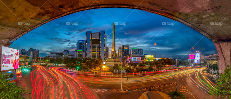Beautiful twilight scene behind the land mark Victory Monument in Bangkok Thailand