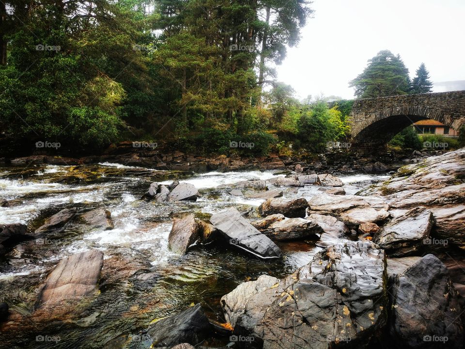 Old bridge and big stones