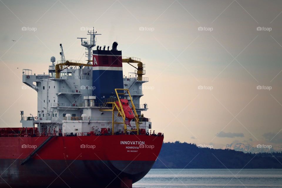 A large container transport ship rests in Commencement Bay near Tacoma, Washington 