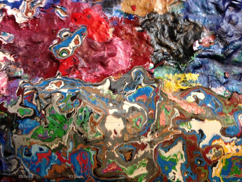 Painter's pallette. Different colors of paint dried on my pallette
