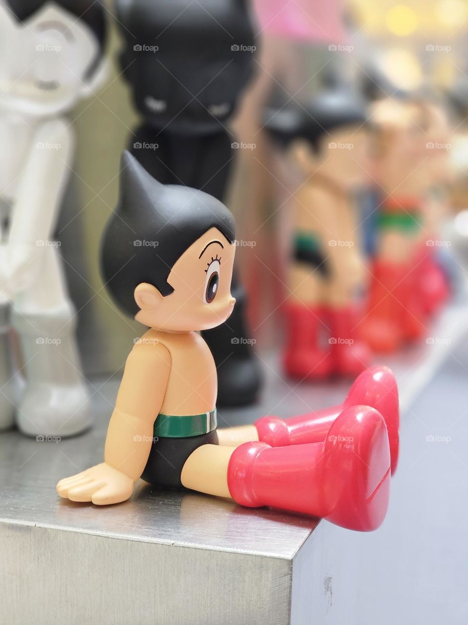 Astro boy sitting