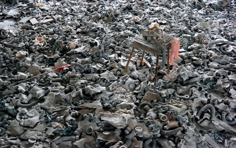 Doll among gas masks