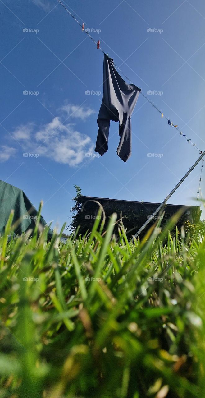 One shirt drying in the sun