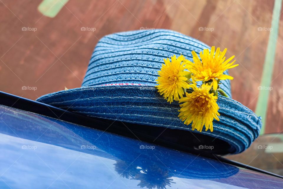 Blue Hat with Yellow Flowers