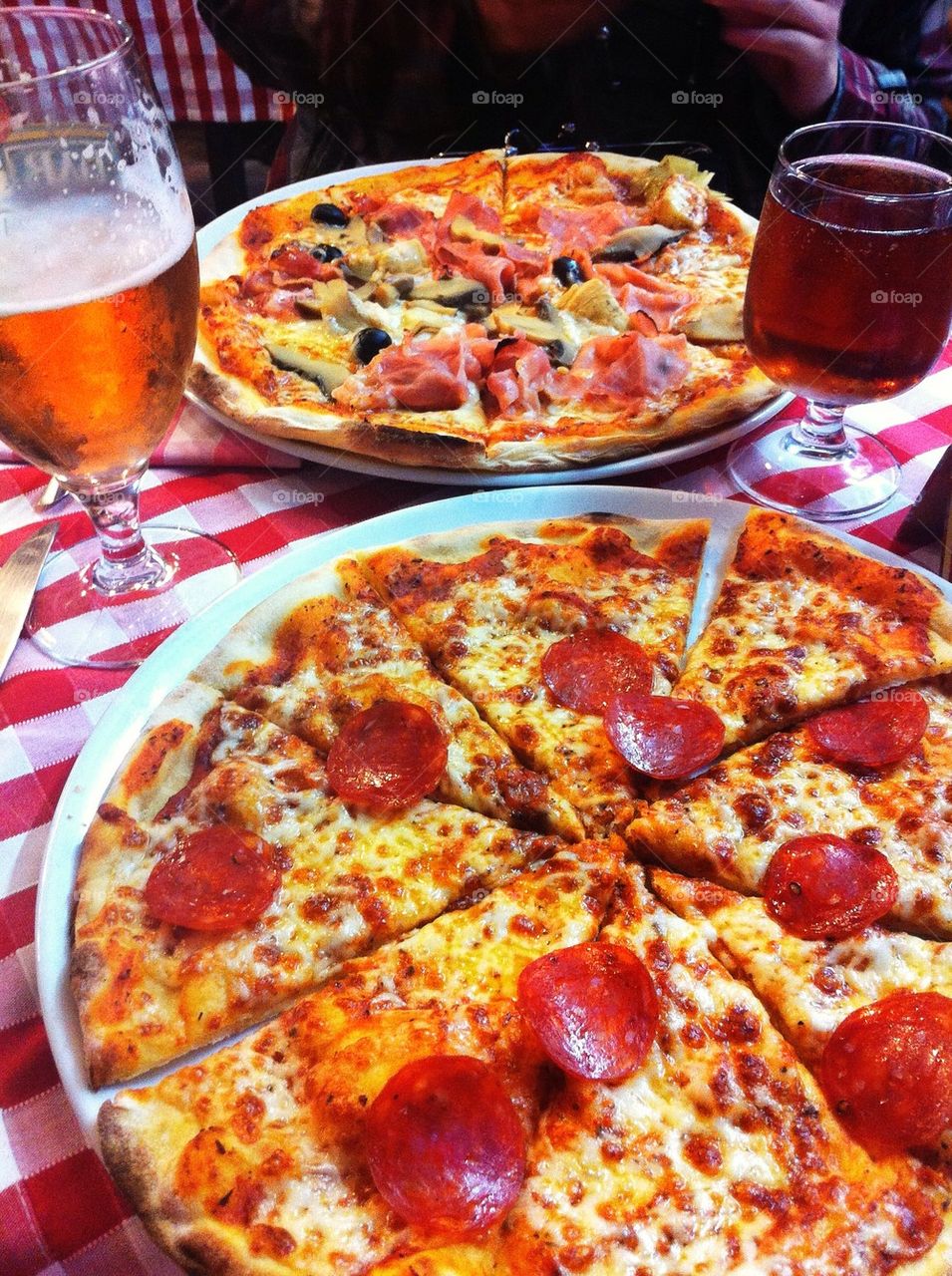 Close-up of pizza and drink