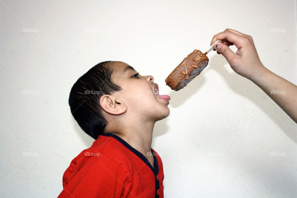food child boy eating by uzzidaman