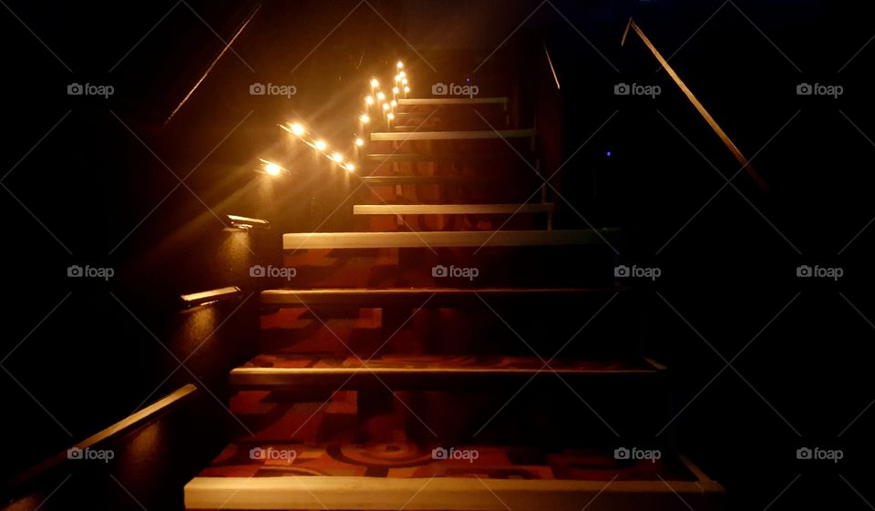 Half illuminated theater steps.