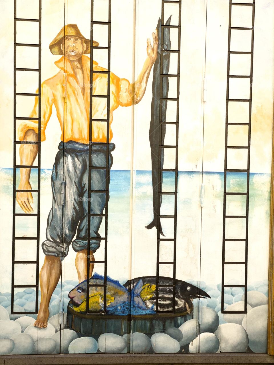 A painting depicting life on Madeira, a fisherman catching the long back scabbard fish!