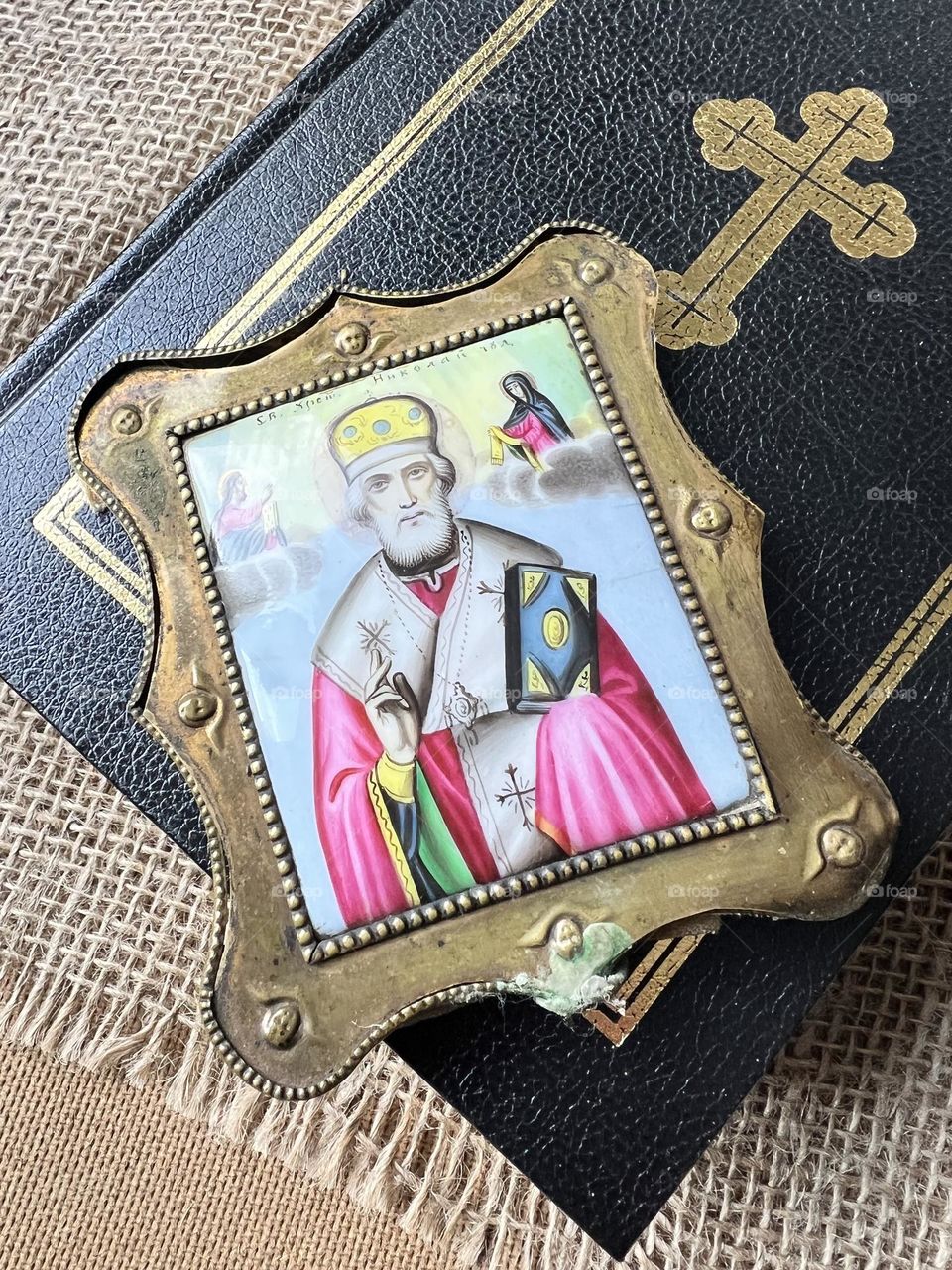 Old icon on bible 