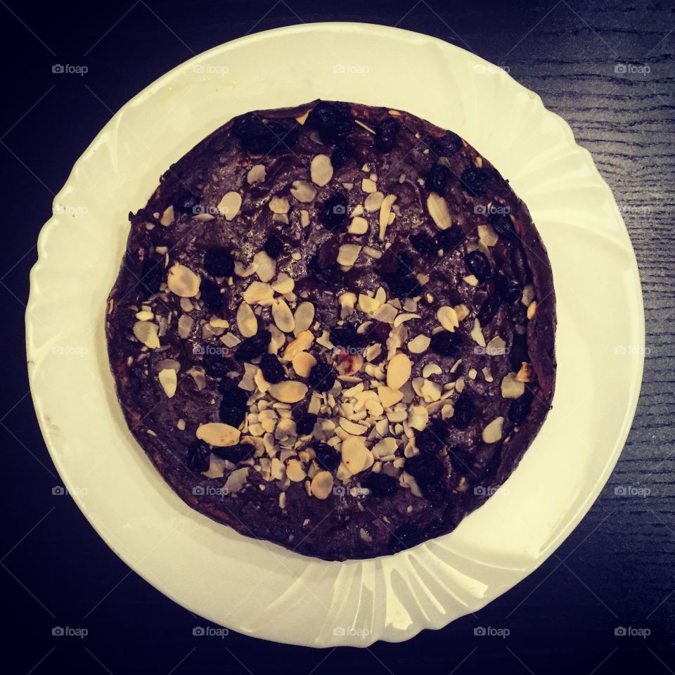 Homemade chocolate cake on a white plate