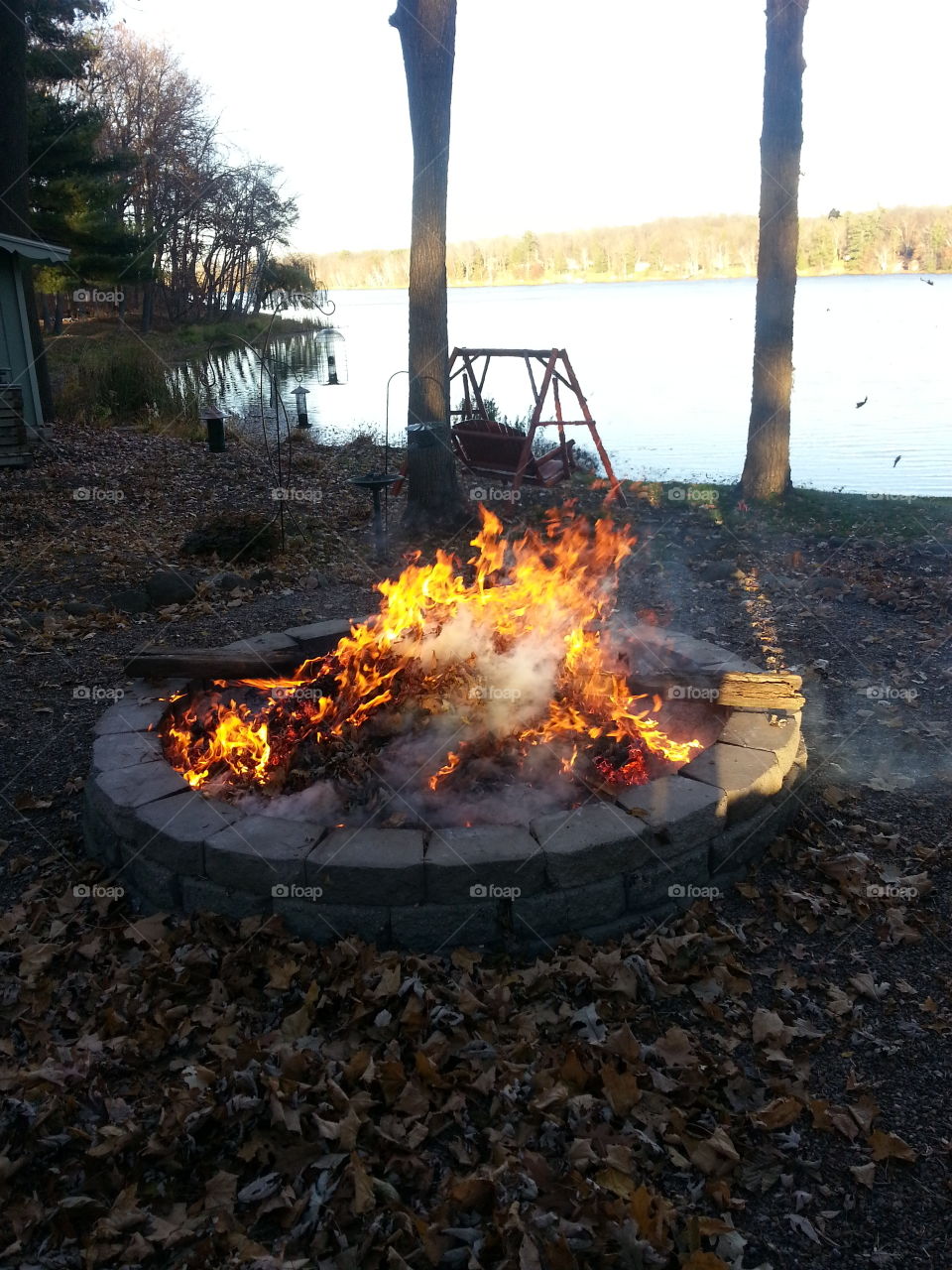 Fire and water. camp fire, lake, peace and quiet equals perfection