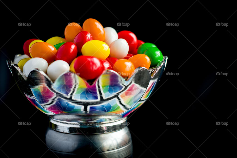 A bowl full of sugar candies.