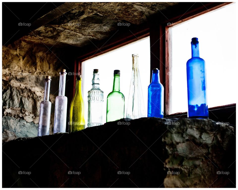 Collection of glass bottles in the sunlight 