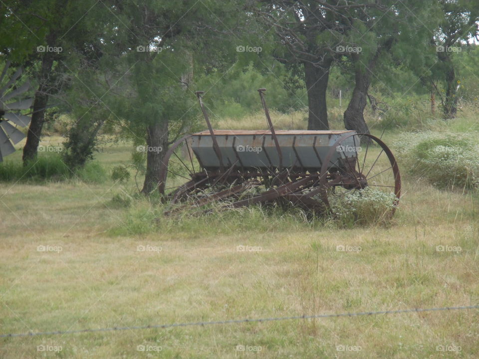 old seeder. This is a picture of a old farm implement that was used to plant crops in the old days