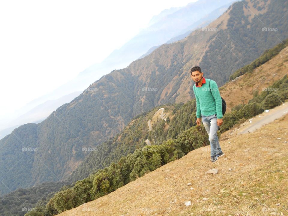 Portrait of indian man on mountain