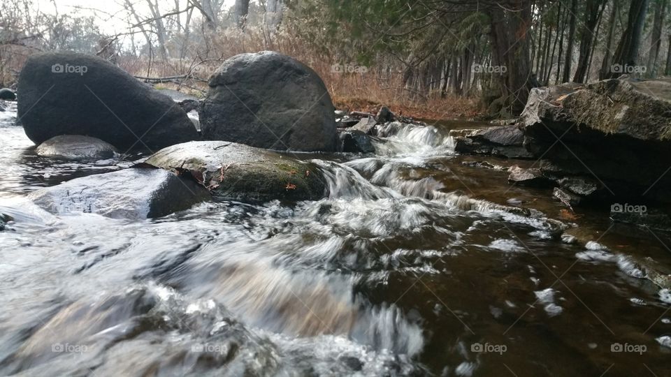 fast water over rocks in a river