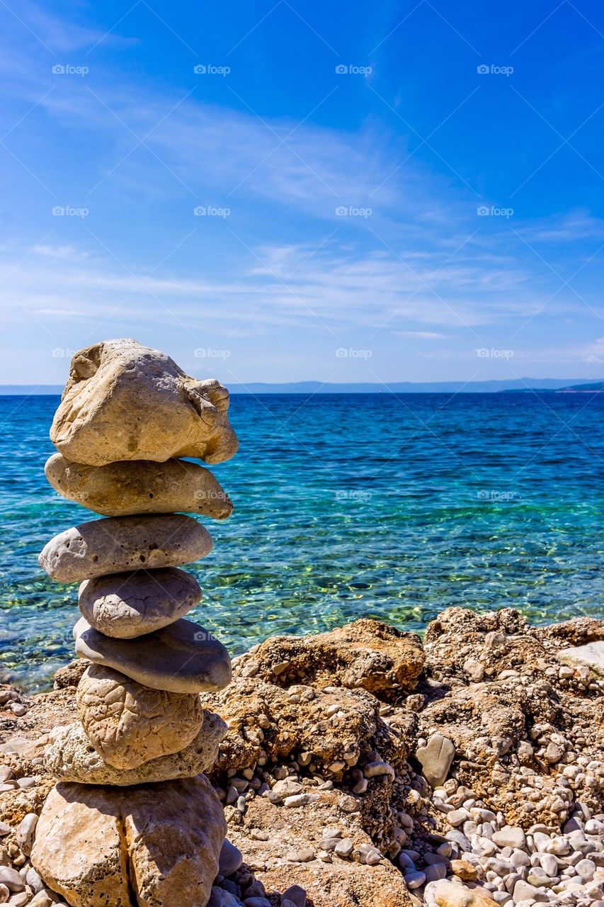 Stack of stones on sea shore