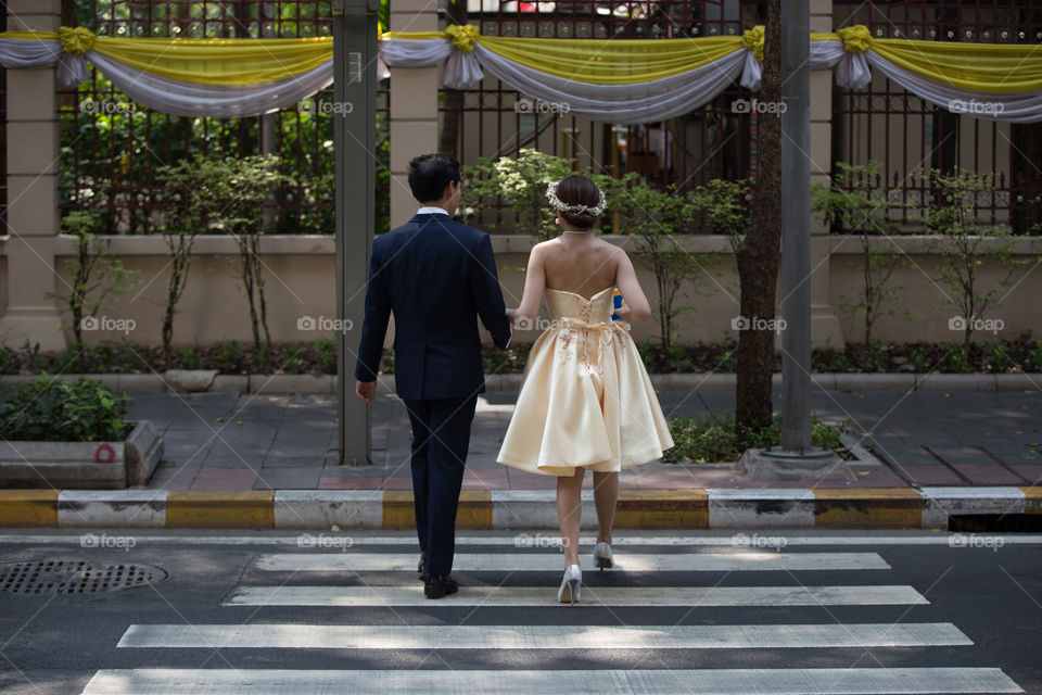 Wedding lover crossing road