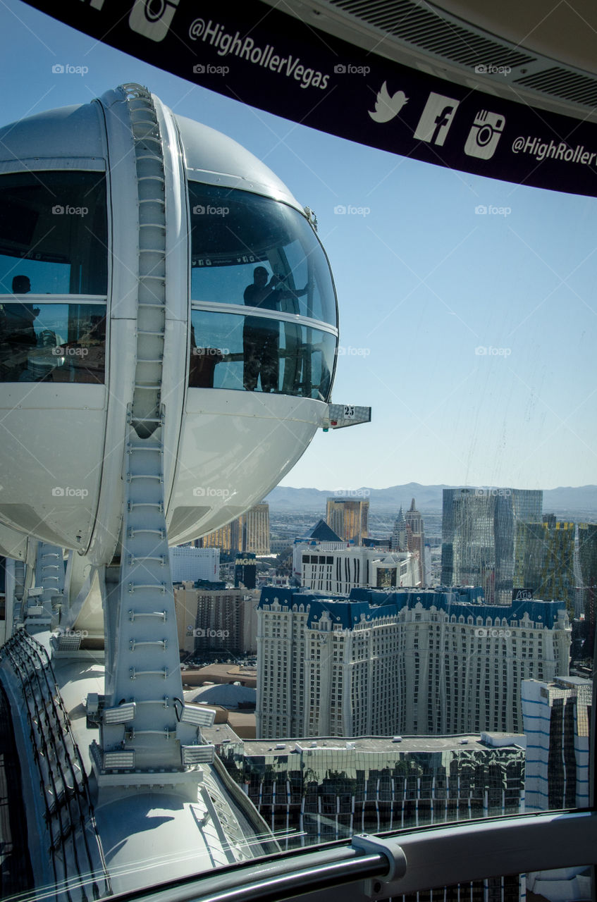 Tourists checking out the view of Las Vegas from the High Roller in Las Vegas located in the LINQ Promenade