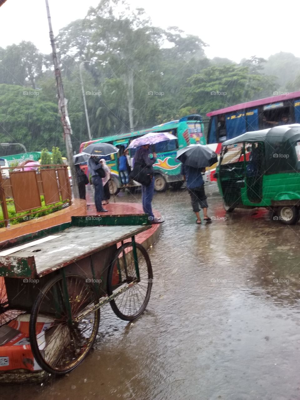Outside the rain, people are running in search of livelihood