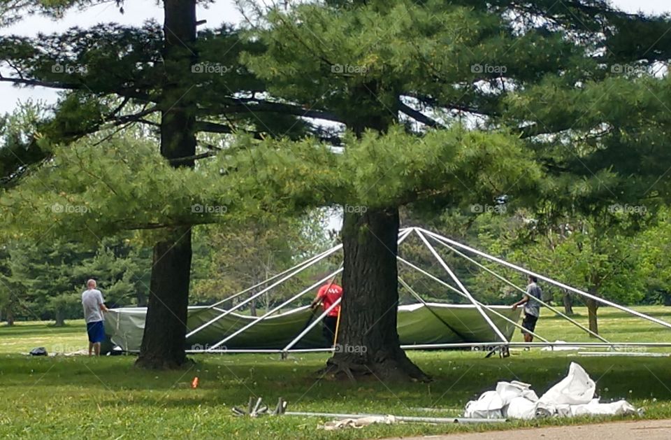 Crew working on event tent