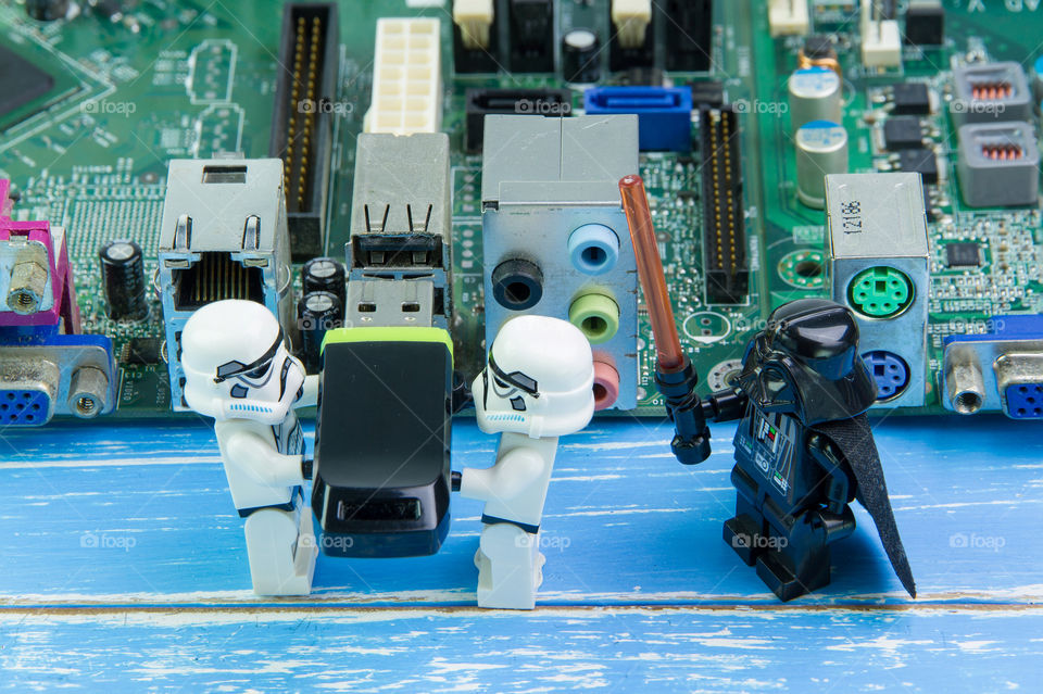 Nonthabure, Thailand - August, 02, 2016: Lego star wars repairing computer motherboard.The lego Star Wars mini figures from movie series.Lego is an interlocking brick system collected around the world.