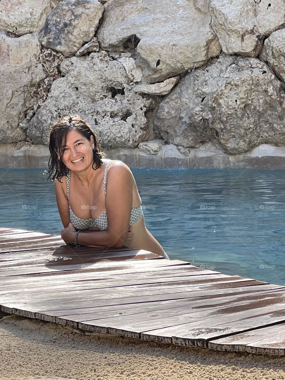Woman happiness in swimming pool 