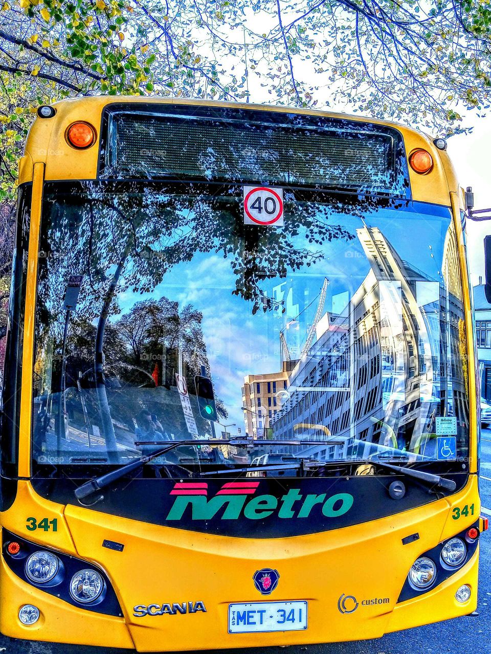 bus with reflections in window