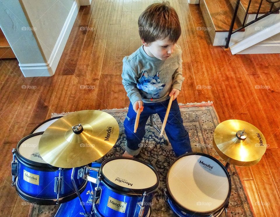Boy Playing Drums. Young Boy Rocking Out On A Drum Set
