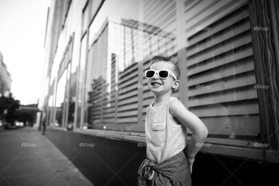 Urban Kid. Lifestyle photo of a boy in a city downtown